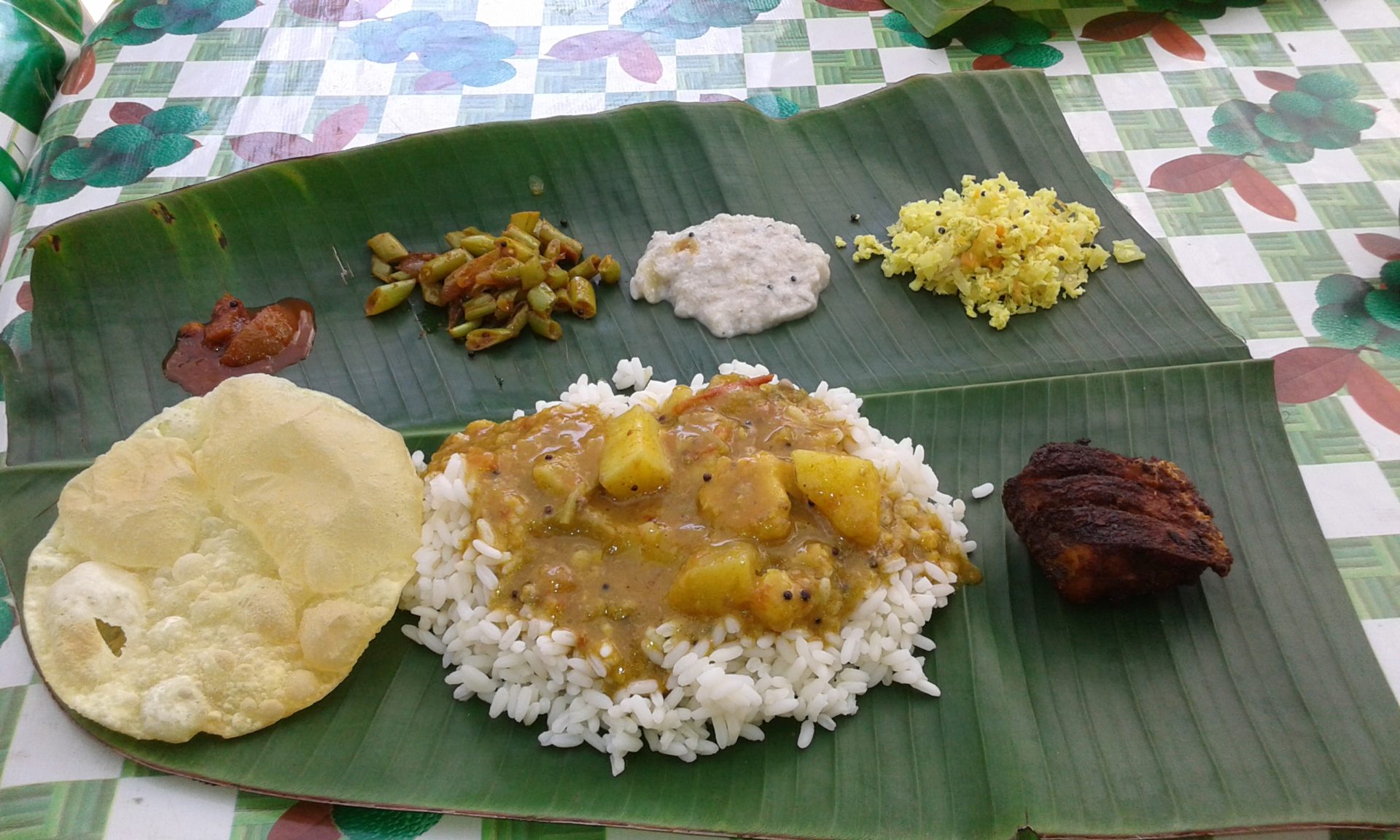 Eine Keralische Mahlzeit auf dem Bananenblatt